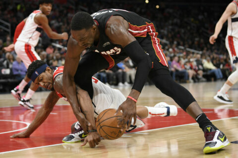 After Butler leaves, Adebayo lifts Heat over Wizards 100-89