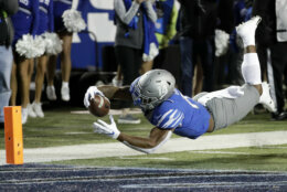 Memphis wide receiver Antonio Gibson dives for the end zone against SMU in the first half of an NCAA college football game Saturday, Nov. 2, 2019, in Memphis, Tenn. Gibson was ruled down just short of the goal line. (AP Photo/Mark Humphrey)