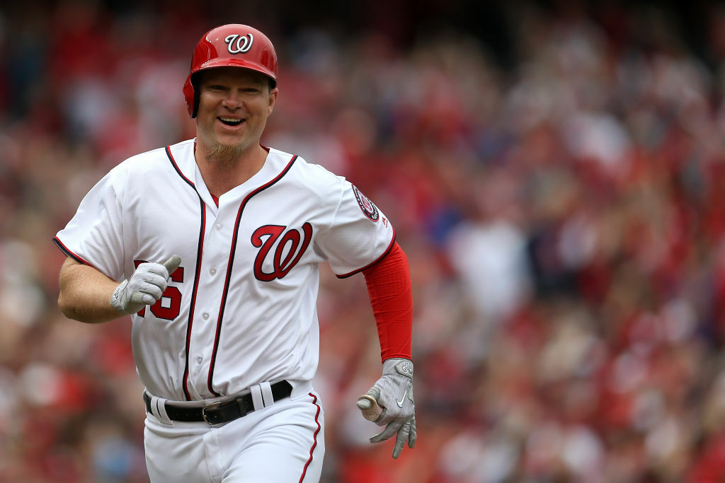 WASHINGTON, DC - APRIL 3: Adam Lind #26 of the Washington Nationals reacts after hitting a two-run home run against the Miami Marlins in the seventh inning of the opening day game at Nationals Park on April 3, 2017 in Washington, DC. (Photo by Matthew Hazlett/Getty Images)