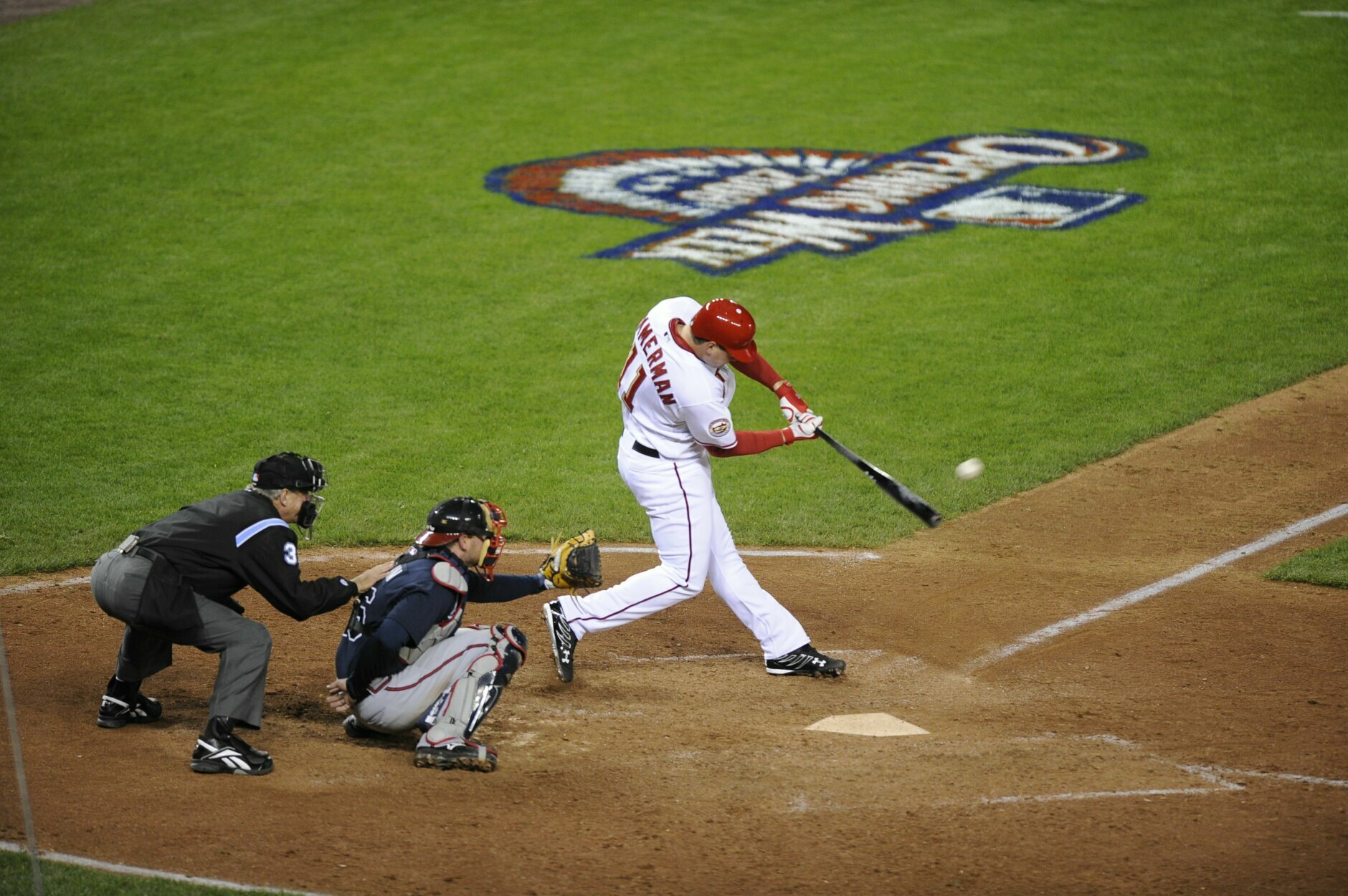 WASHINGTON - MARCH 30:  Ryan Zimmerman #11 of the Washington Nationals hits the game winning home-run in the bottom of the 9th inning during the game against the Atlanta Braves on opening day on March 30, 2008 at Nationals Park in Washington, D.C. The Nationals won 3-2. (Photo by G Fiume/Getty Images)