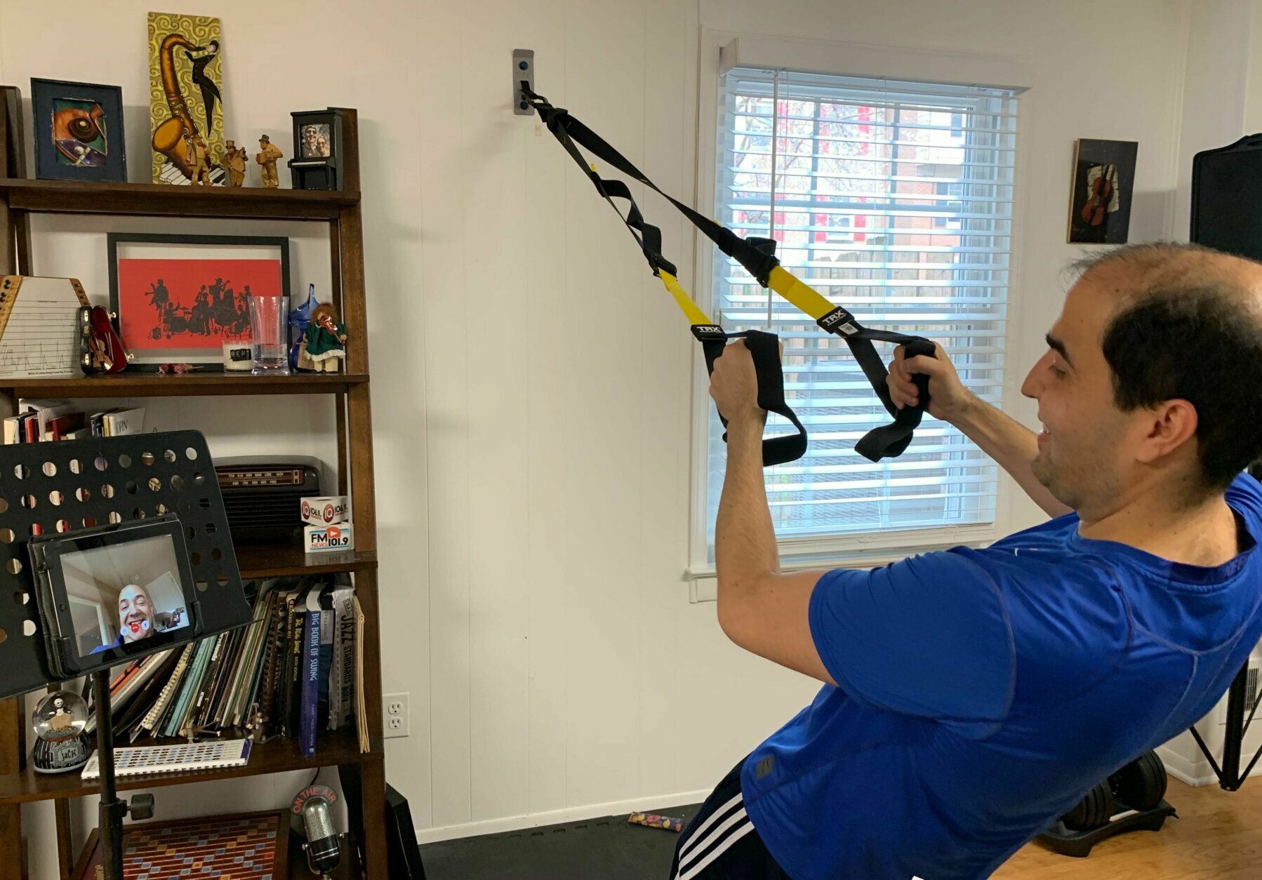 WTOP's Mike Murillo works out in his home gym with tips from his (virtual) trainer, Nick Irons.
