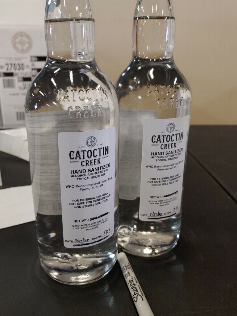 Catoctin Creek Distillery in Purcelville, Pa., is pumping out hand sanitizer, though you can see hints of what their original product is in the packaging.