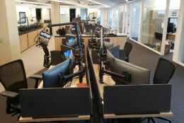 Empty desks and chairs in the WTOP newsroom.
