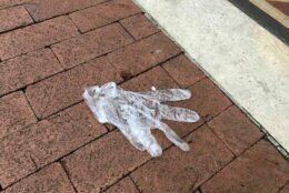 WTOP's Dave Dildine has been documenting instances of PPE being littered in public areas. Experts say this behavior poses a risk to the whole community. 