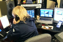 WTOP Traffic Reporter Mary DePompa answers a call to the WTOP Traffic Center from her home studio. (WTOP/Mary DePompa)