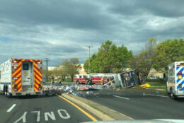 Overturned truck carrying beer