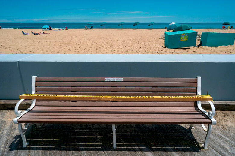 Ocean City bench with caution tape over it