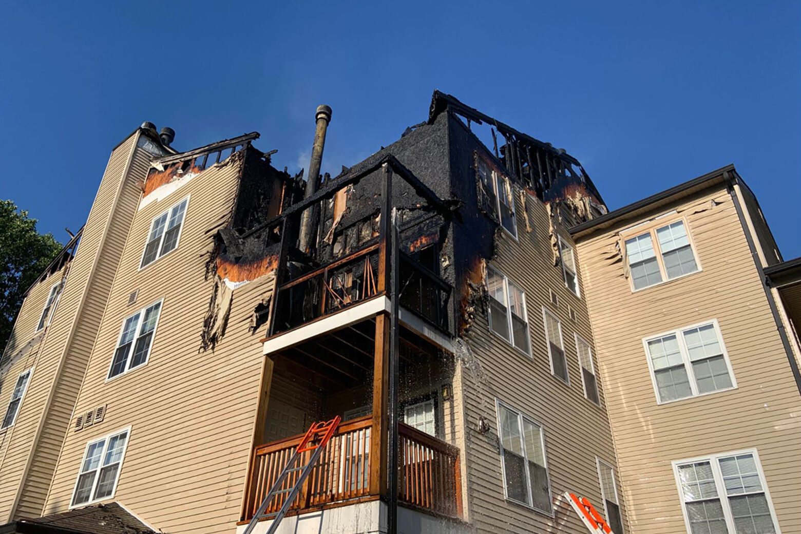 Apartment fire near Dulles Airport caused by discarded fireplace ashes