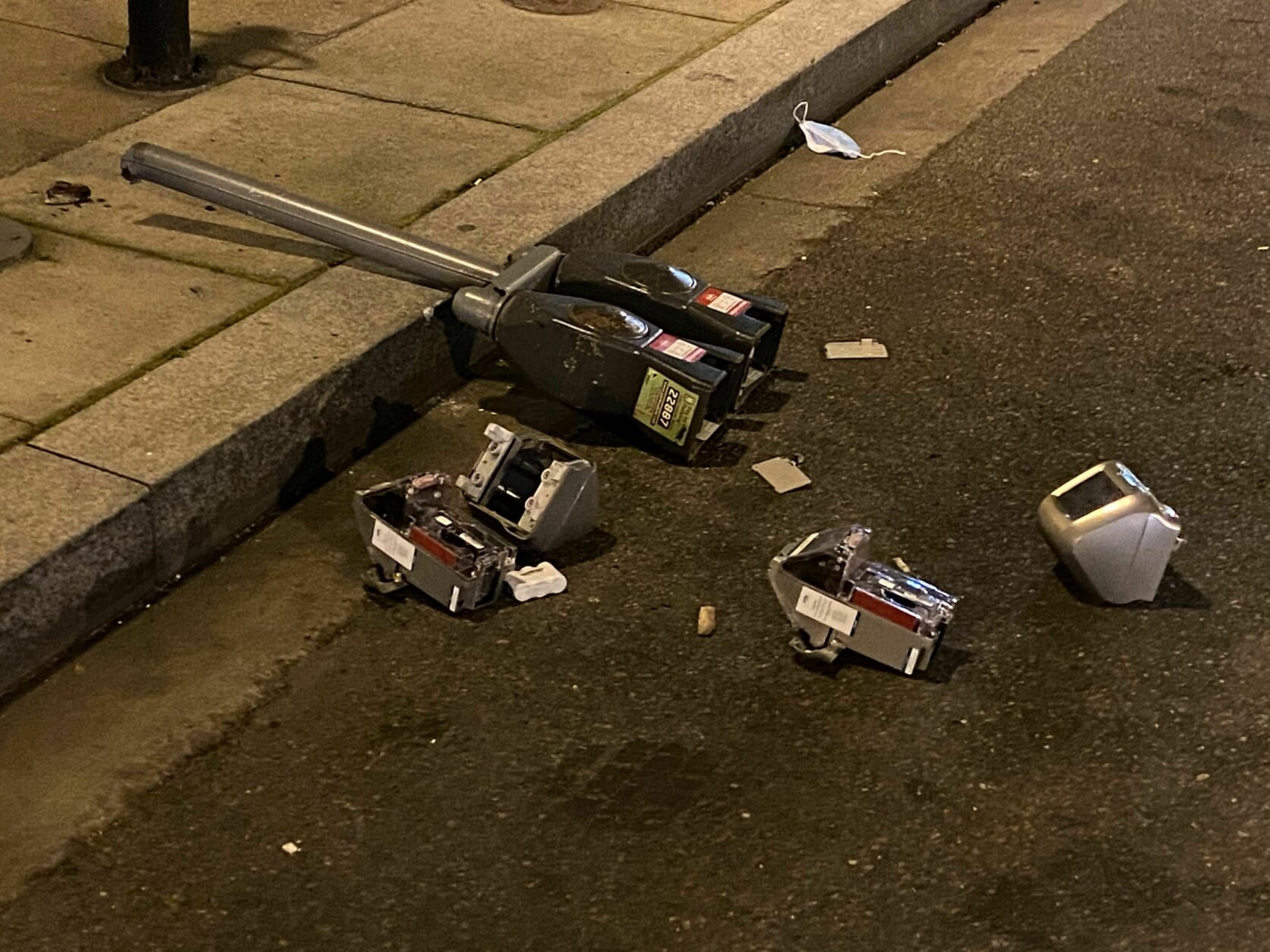 <p>A parking meter is seen tipped over along L Street by Farrugut North. (John Domen/WTOP)</p>
