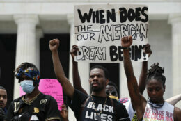 Demonstrators protest Saturday, June 6, 2020, at the Lincoln Memorial in Washington, over the death of George Floyd, a black man who was in police custody in Minneapolis. Floyd died after being restrained by Minneapolis police officers. (AP Photo/Alex Brandon)