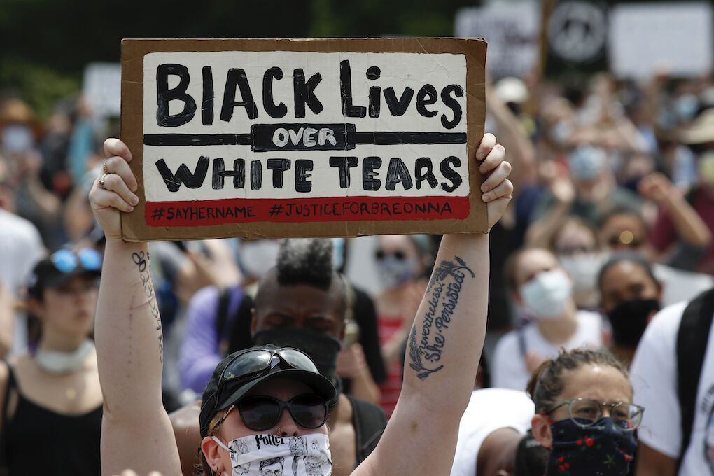 Demonstrators protest Saturday, June 6, 2020, at the Lincoln Memorial in Washington, over the death of George Floyd, a black man who was in police custody in Minneapolis. Floyd died after being restrained by Minneapolis police officers. (AP Photo/Alex Brandon)