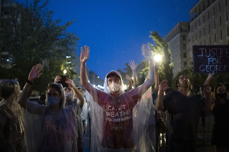 Protesters in rain in DC
