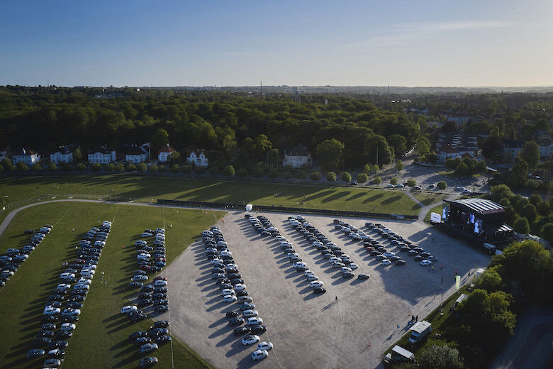 AARHUS, DENMARK - MAY 28: General view of the drive in cinema with AGF Aarhus fans in cars watching the game on a big screen during the Danish 3F Superliga match between AGF Aarhus and Randers FC at Ceres Park on May 28, 2020 in Aarhus, Denmark. (Photo by Lars Ronbog / FrontZoneSport via Getty Images)