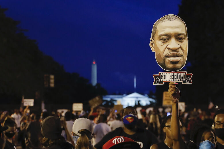 Demonstrators protest Saturday, June 6, 2020, near the White House in Washington, over the death of George Floyd, a black man who was in police custody in Minneapolis. Floyd died after being restrained by Minneapolis police officers. (AP Photo/Jacquelyn Martin)
