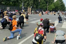 <p>Dozens gather for a moment of silence at 16th and H streets in D.C. They stayed for 8 minutes and 46 seconds &#8212; the length of time that a knee was pressed into George Floyd’s neck.</p>

