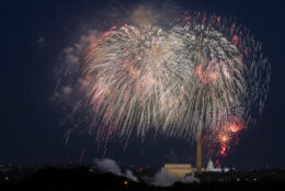 Fourth of July fireworks explode over the Lincoln Memorial, the Washington Monument and the U.S. Capitol along the National Mall in Washington, Saturday, July 4, 2020. (AP Photo/Cliff Owen)