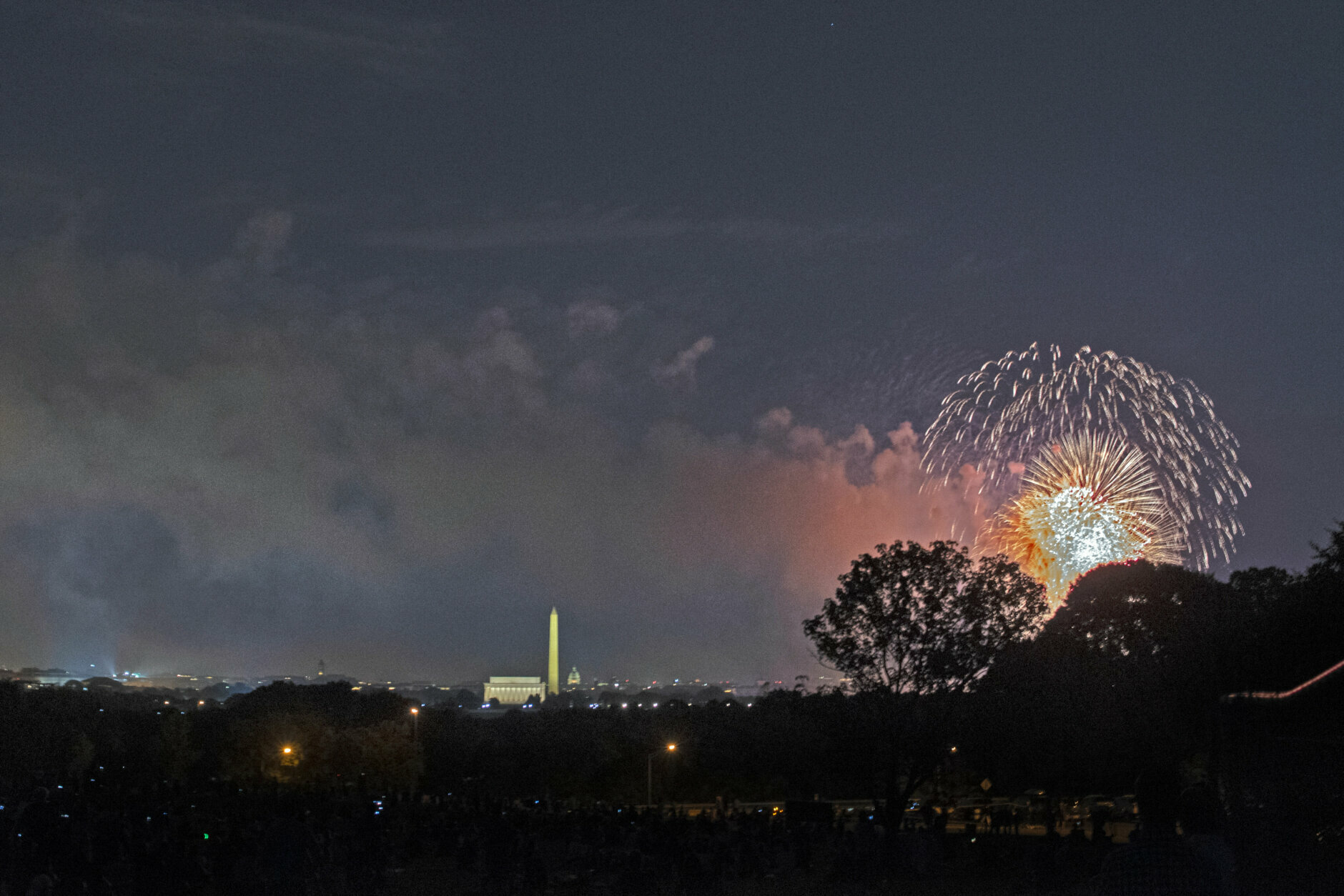Fourth of July fireworks explode over the Lincoln Memorial, the Washington Monument and the U.S. Capitol, along the National Mall in Washington, Saturday, July 4, 2020. (AP Photo/Cliff Owen)