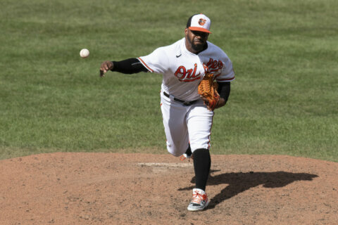 Orioles trade right-hander Mychal Givens to Rockies