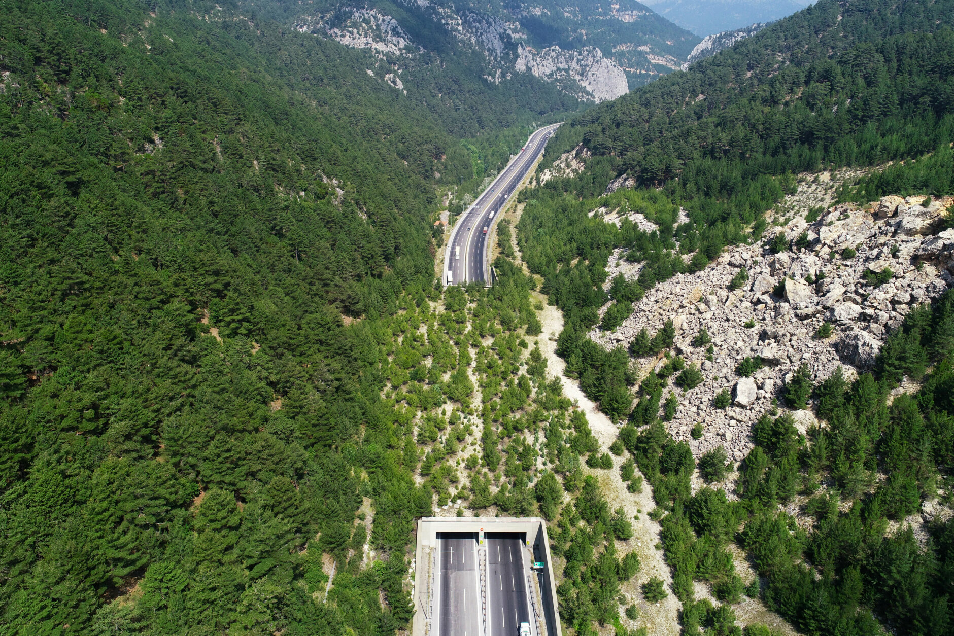 ADANA, TURKEY - JULY 08: A drone photo shows an "ecological overpass" located at Tarsus-Pozanti Highway in Adana, Turkey on July 08, 2020. "Ecological bridges", where animals cross safely, have been built on highways by the Turkish Ministry of Transport and Infrastructure to protect both wild animals and prevent traffic accidents caused by wildlife. (Photo by Eren Bozkurt/Anadolu Agency via Getty Images)