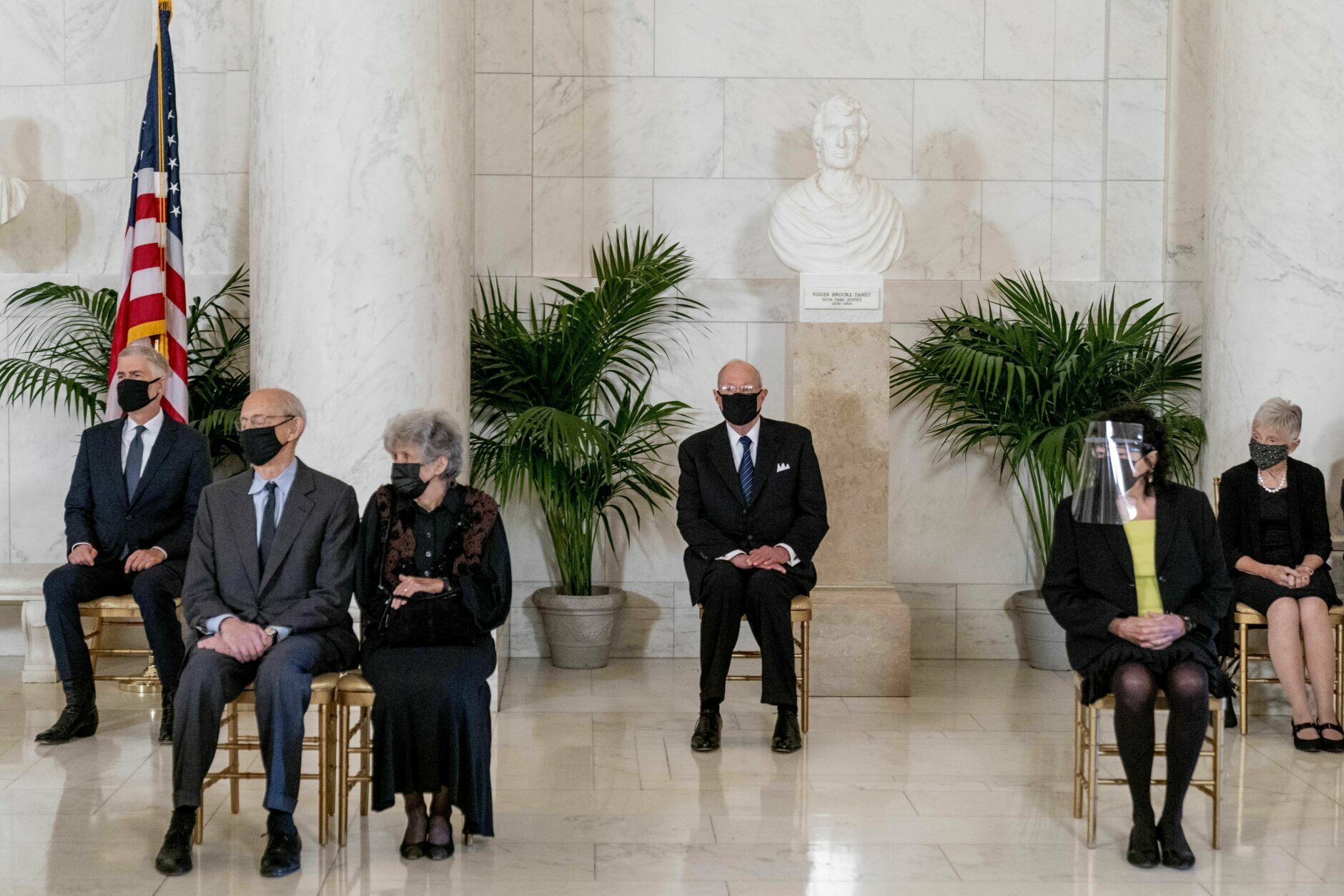 From left, Justice Neil Gorsuch, Justice Stephen Breyer and his wife Joanna, Retired Justice Anthony Kennedy, Justice Sonia Sotomayor, and Maureen Scalia, the wife of the late Justice Antonin Scalia, attend a private ceremony for Justice Ruth Bader Ginsburg at the Supreme Court in Washington, Wednesday, Sept. 23, 2020. Ginsburg, 87, died of cancer on Sept. 18. (AP Photo/Andrew Harnik, Pool)