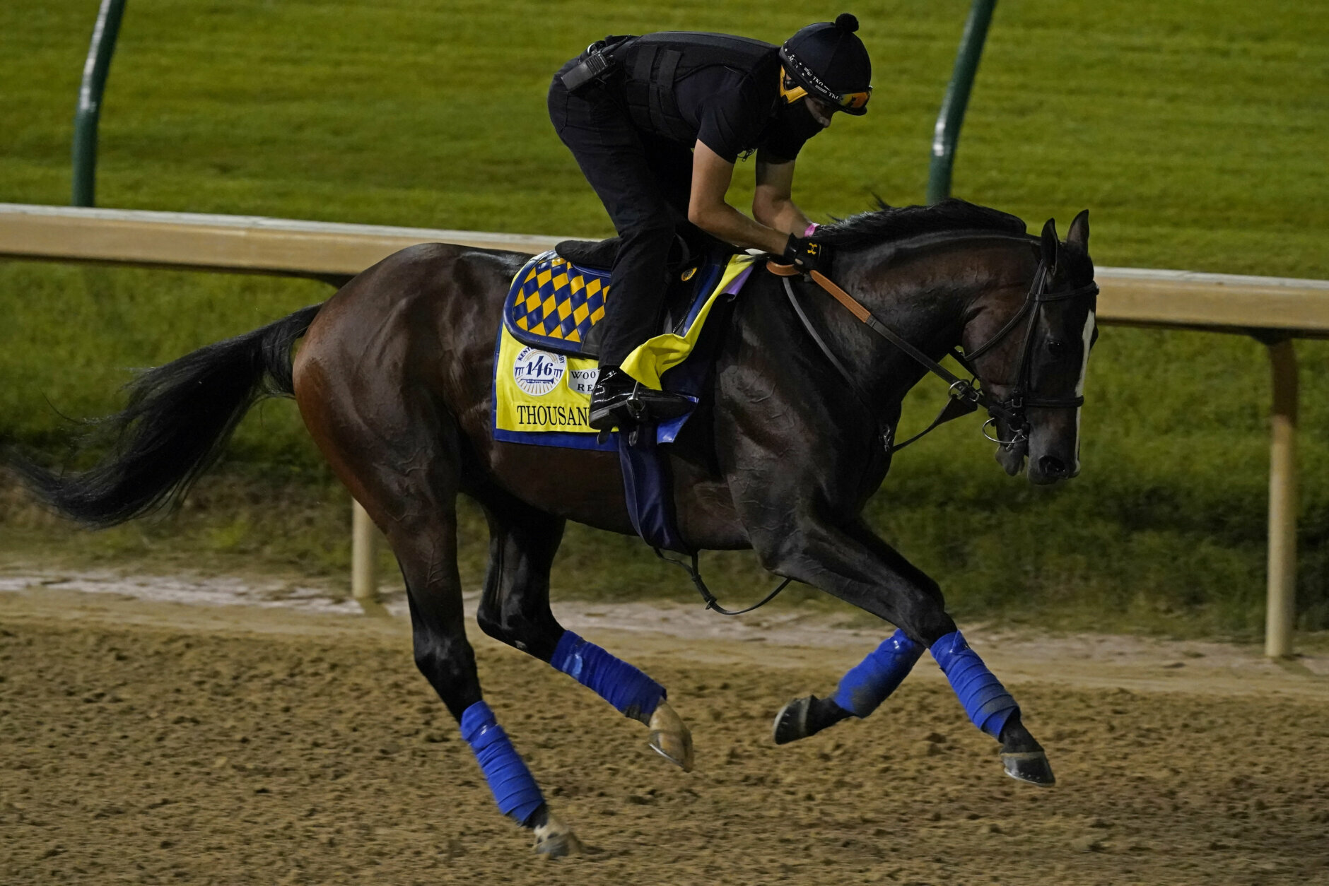 Kentucky Derby entry Thousand Words runs during an early morning workout at Churchill Downs, Friday, Sept. 4, 2020, in Louisville, Ky. The Kentucky Derby is scheduled for Saturday, Sept. 5th. (AP Photo/Charlie Riedel)