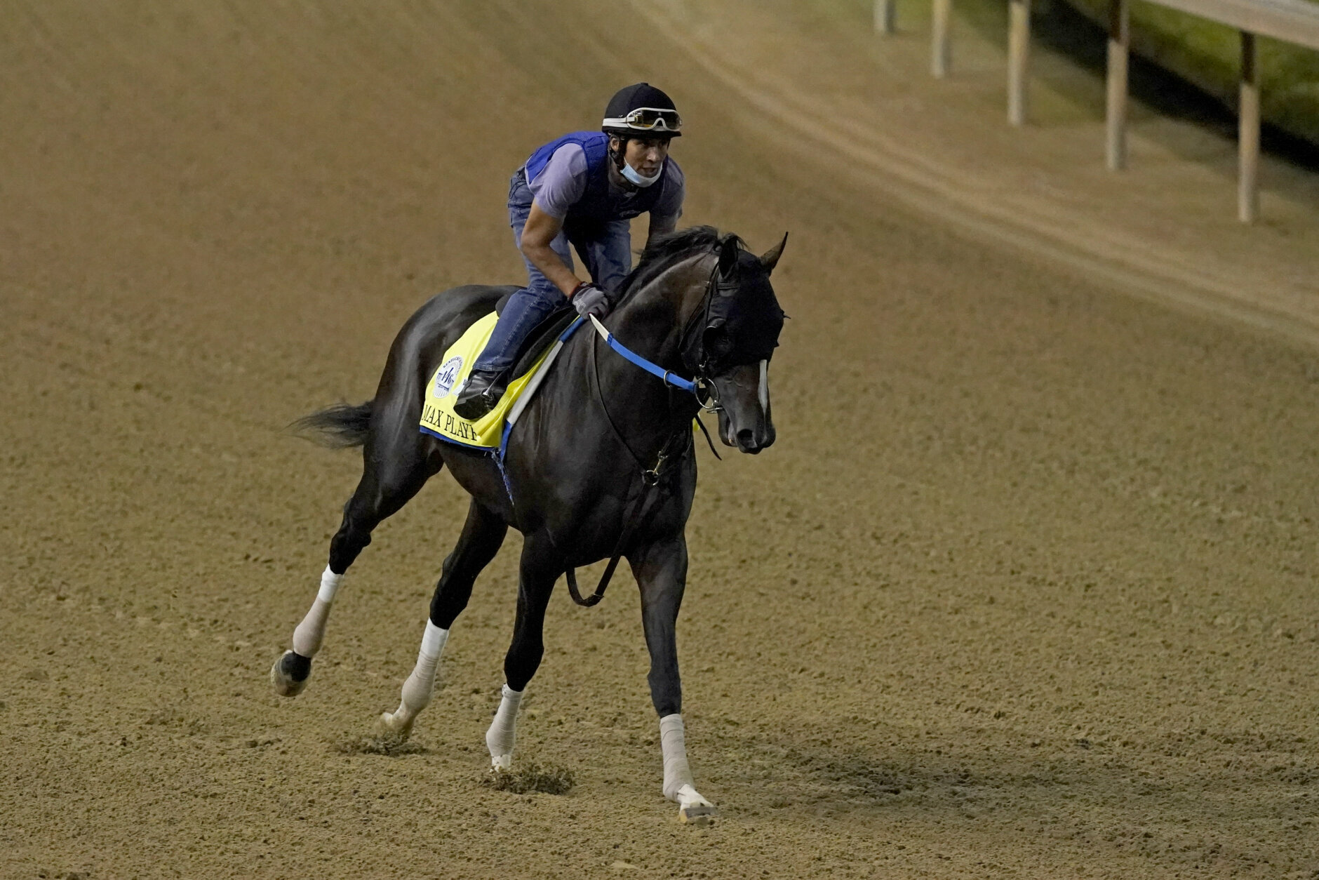 Kentucky Derby entry Max Player runs during an early morning workout at Churchill Downs, Friday, Sept. 4, 2020, in Louisville, Ky. The Kentucky Derby is scheduled for Saturday, Sept. 5th. (AP Photo/Charlie Riedel)
