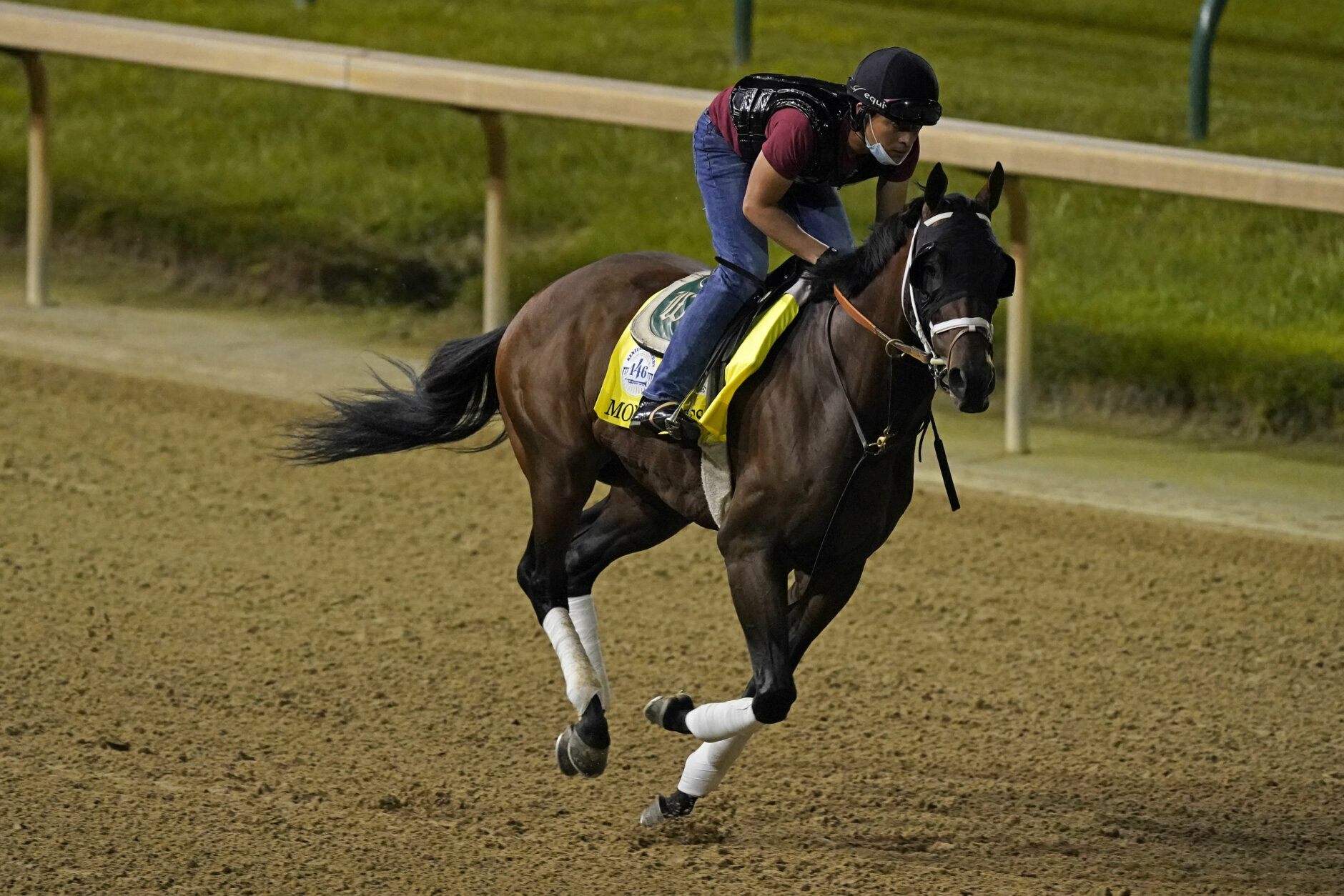 Kentucky Derby entry Money Moves runs during an early-morning workout at Churchill Downs, Friday, Sept. 4, 2020, in Louisville, Ky. The Kentucky Derby is scheduled for Saturday, Sept. 5th. (AP Photo/Charlie Riedel)