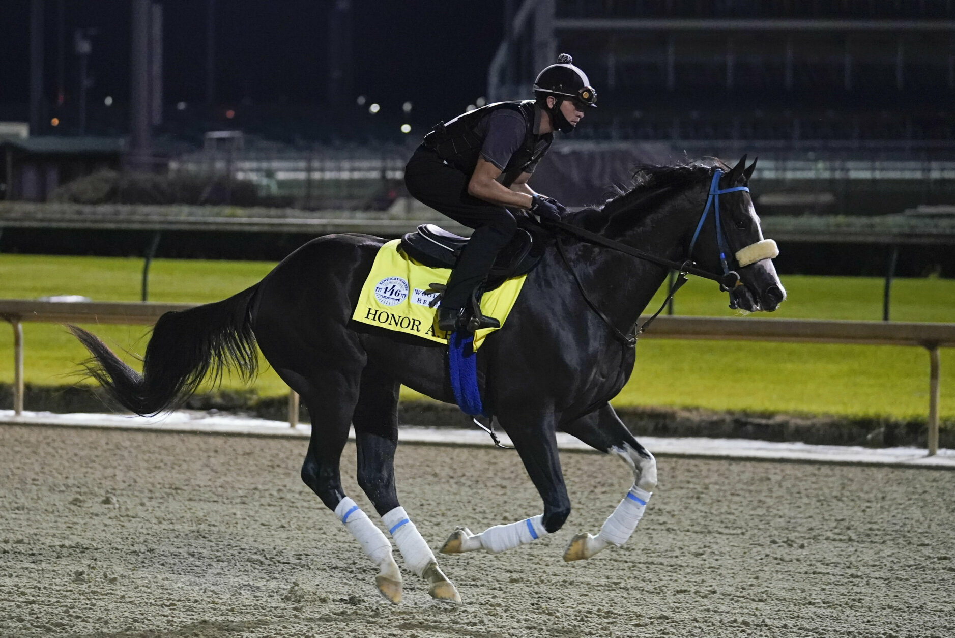 Kentucky Derby entry Honor A. P. runs during a workout at Churchill Downs, Friday, Sept. 4, 2020, in Louisville, Ky. The Kentucky Derby is scheduled for Saturday, Sept. 5th. (AP Photo/Darron Cummings)