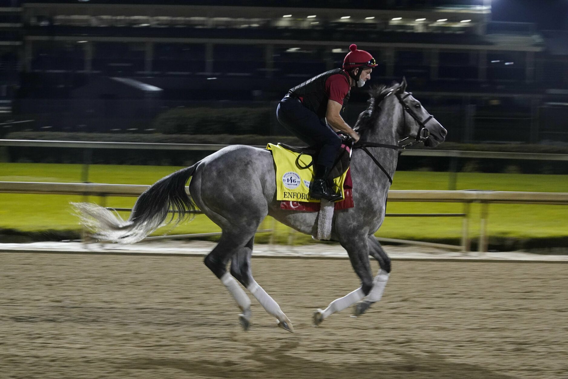 Kentucky Derby entry Enforceable runs during a workout at Churchill Downs, Friday, Sept. 4, 2020, in Louisville, Ky. The Kentucky Derby is scheduled for Saturday, Sept. 5th. (AP Photo/Darron Cummings)