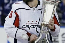 <p>Ovechkin holds the Prince of Wales trophy in May 2018, after the Capitals beat Tampa Bay in Game 7 of the Eastern Conference Finals.</p>
