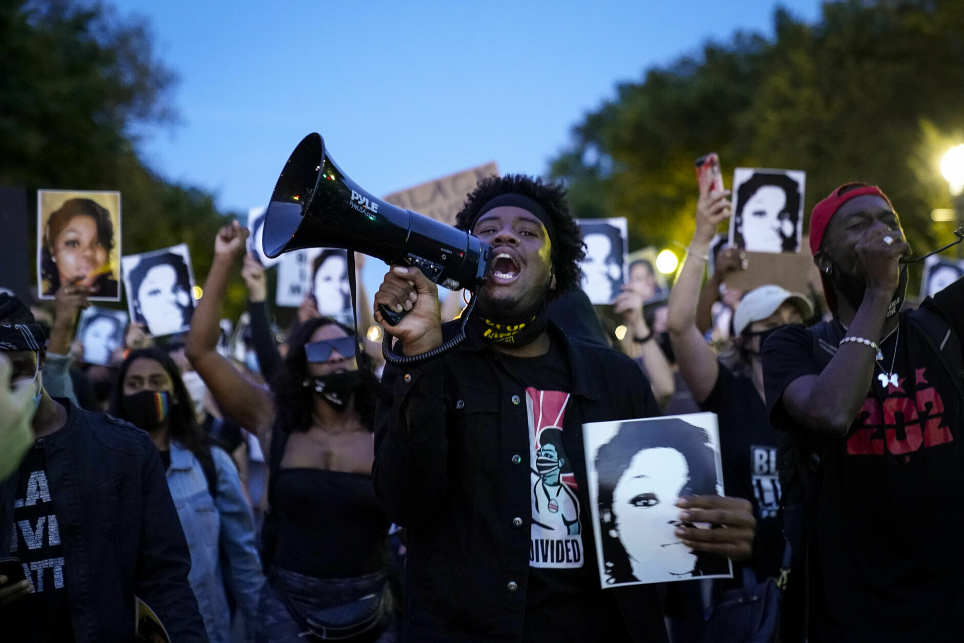 WASHINGTON, DC - SEPTEMBER 23: Demonstrators march along Constitution Avenue in protest following a Kentucky grand jury decision in the Breonna Taylor case on September 23, 2020 in Washington, DC. A Kentucky grand jury indicted one police officer involved in the shooting of Breonna Taylor with 3 counts of wanton endangerment. No officers were indicted on charges in connection to Taylor's death. (Photo by Drew Angerer/Getty Images)
