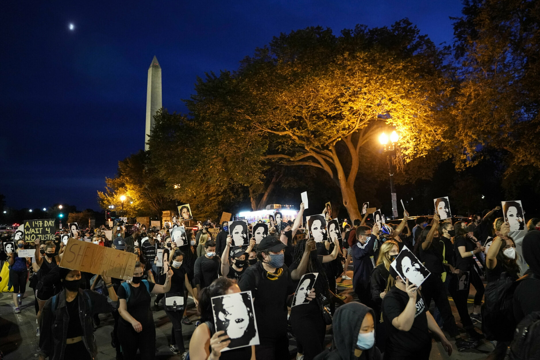 WASHINGTON, DC - SEPTEMBER 23: Demonstrators march near the White House in protest following a Kentucky grand jury decision in the Breonna Taylor case on September 23, 2020 in Washington, DC. A Kentucky grand jury indicted one police officer involved in the shooting of Breonna Taylor with 3 counts of wanton endangerment. No officers were indicted on charges in connection to Taylor's death. (Photo by Drew Angerer/Getty Images)