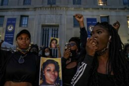 WASHINGTON, DC - SEPTEMBER 23:
Demonstrators gather at the U.S. Department of Justice before marching to the White House in a call for justice for Breonna Taylor, who was killed by a member of the Louisville Police Department during a middle-of-the-night raid of Taylor's apartment, in Washington, DC, on Wednesday, September 23, 2020.  The actions of the officer who killed Taylor has been ruled justified while another of the three officers was indicted on a warrant endangerment charge.
(Photo by Jahi Chikwendiu/The Washington Post via Getty Images)