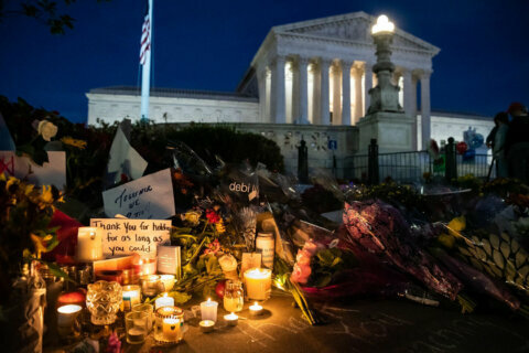 Candlelight vigil outside of the Supreme Court honors the life of Ruth Bader Ginsburg