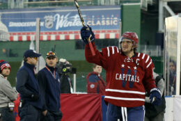 <p>Ovechkin celebrates after winning the 2015 Winter Classic against the Chicago Blackhawks at Nationals Park on New Year&#8217;s Day.</p>
