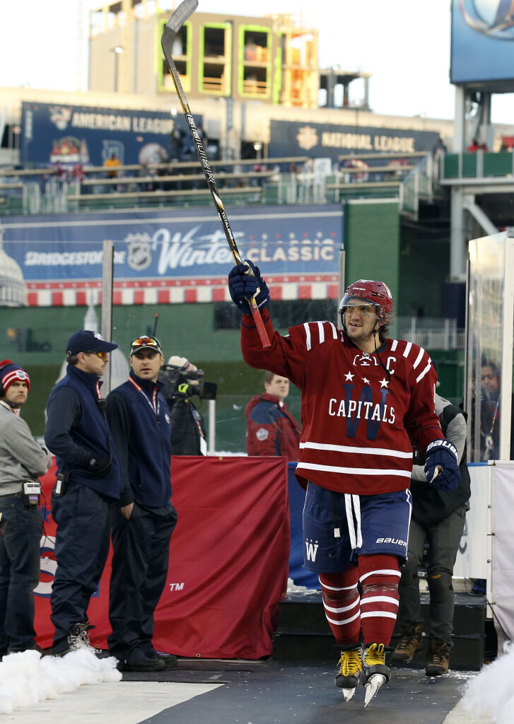 <p>Ovechkin celebrates after winning the 2015 Winter Classic against the Chicago Blackhawks at Nationals Park on New Year&#8217;s Day.</p>
