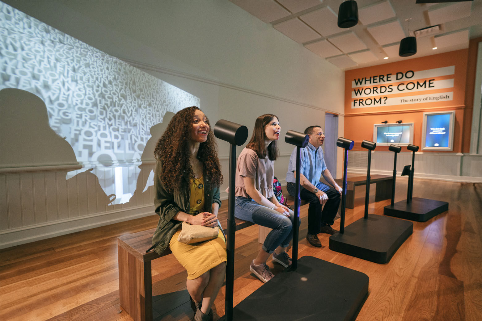 Voice-activated exhibits include “Where Do Words Come From,” a 22-foot-tall talking word wall, an acoustically-sealed room where visitors use a teleprompter to deliver their own versions of historic speeches and a karaoke lounge. (Courtesy DuHon Photography/Long Story Short Media)