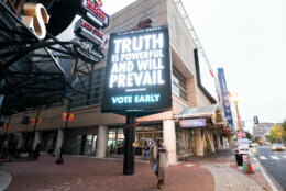 A sign outside of Capital One Arena urges residents to vote early before the start of the first day of early voting in Washington on Tuesday, Oct. 27, 2020.(Photo By Bill Clark/CQ-Roll Call, Inc via Getty Images)