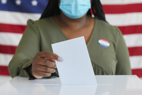 Volunteer health ambassadors sent to polling stations around Maryland