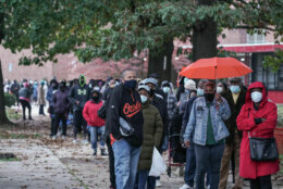 BALTIMORE, MARYLAND - OCTOBER 26:  Residents of Baltimore City line up at at Edmondson High School as early voting begins in Maryland on October 26, 2020 in Baltimore, Maryland. With eight days to go until Election Day, President Donald Trump and former Vice President Joe Biden continue to campaign in battleground states. (Photo by J. Countess/Getty Images)