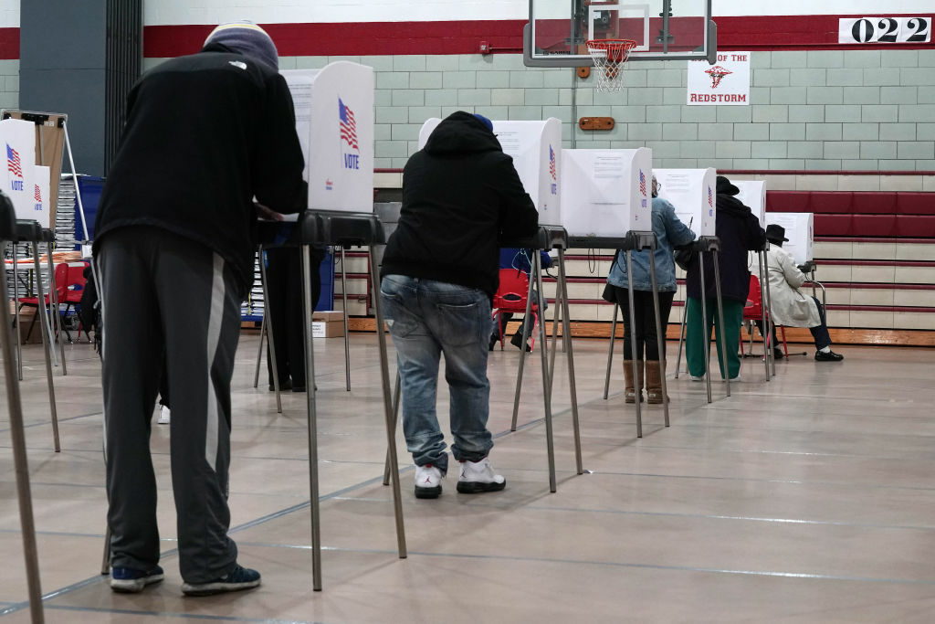 BALTIMORE, MARYLAND - OCTOBER 26:  Residents of Baltimore City cast votes as early voting begins in the state of Maryland at Edmondson High School on October 26, 2020 in Baltimore, Maryland.  In addition to the Presidential race, the congressional seat held by the late Rep. Elijah Cummings’s (D-MD) is on the ballot with Kweisi Mfume (D-MD) running against GOP candidate, Kimberly Klacik (R-MD).  (Photo by J. Countess/Getty Images)