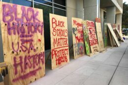 The art for the protest has been put on display by demonstrators who say they will occupy the area outside the Department of Education building in D.C. until their demands are met.