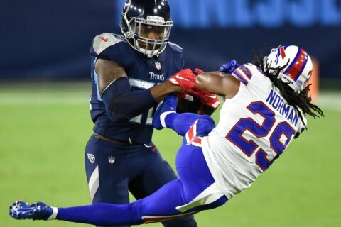 Derrick Henry tosses Bills’ Josh Norman with epic stiff arm