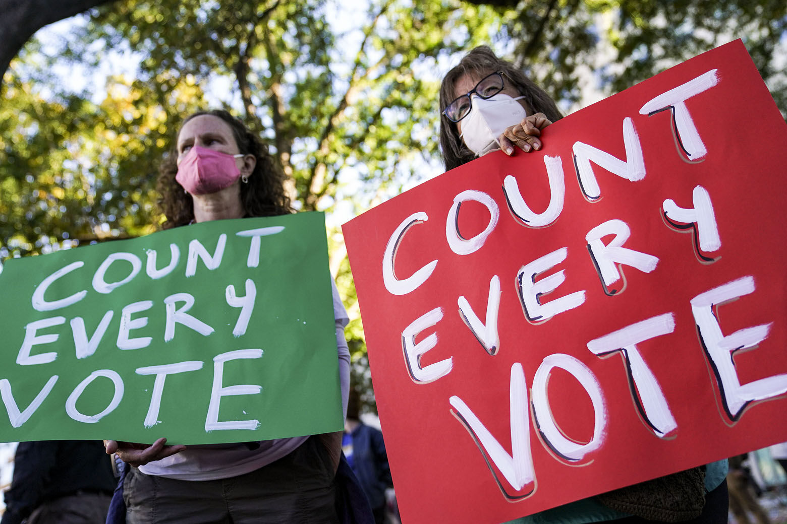 Demonstrators attend a rally to support all votes being counted one day after Election Day, Wednesday, Nov. 4, 2020, in Washington. (AP Photo/John Minchillo)