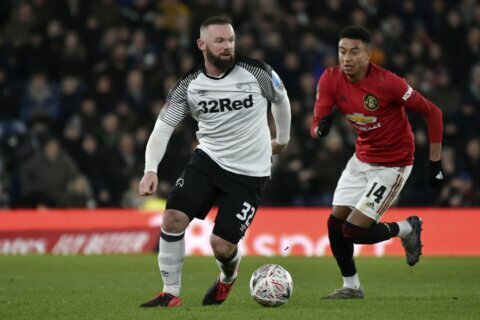 Rooney stops playing to take Derby manager job permanently