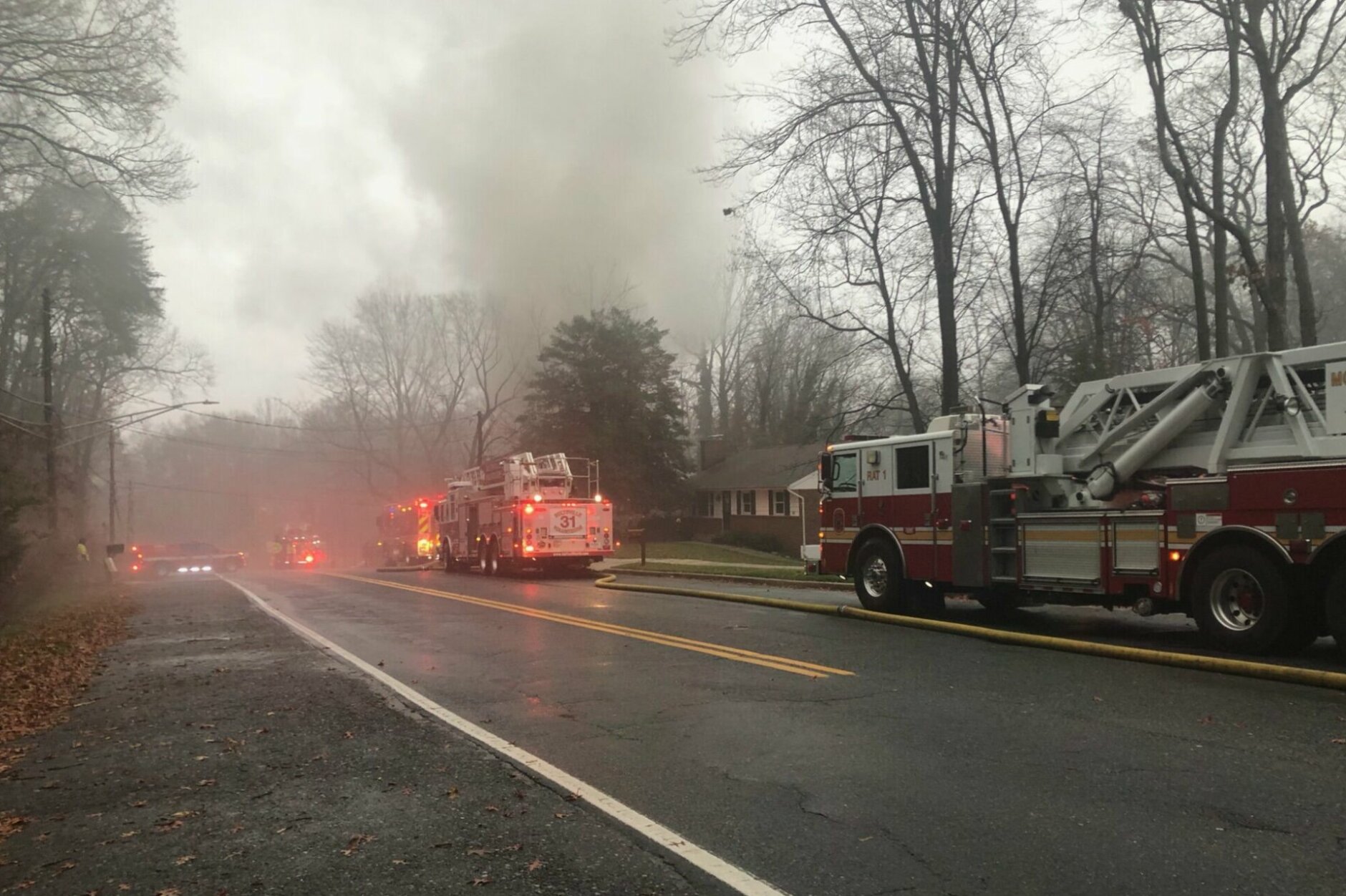 Prince George's Co. firefighters battle a fire on Bond Mill Road in West Laurel on Monday morning. (Courtesy PGFD/Sarah Porter)