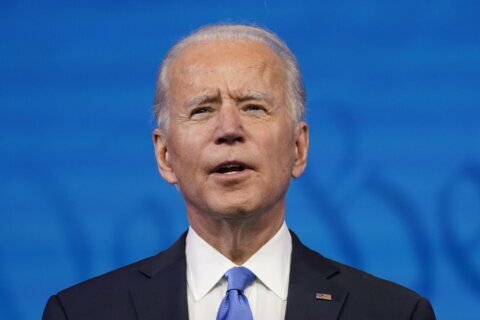 ‘Democracy prevailed’: Biden aims to unify divided nation