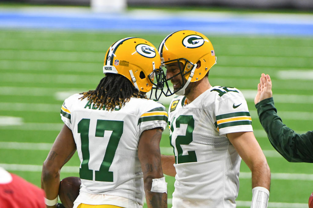 <p><b><i>Packers 31</i></b><br />
<b><i>Lions 24</i></b></p>
<p>Led by <a href="https://profootballtalk.nbcsports.com/2020/12/10/aaron-rodgers-davante-adams-makes-me-a-better-person-and-quarterback/" target="_blank" rel="noopener">a beautiful bromance</a>, Green Bay clinched the NFC North and slid ahead of New Orleans for the 1-seed in the NFC. <a href="https://twitter.com/packers/status/1338348668064202752?s=20" target="_blank" rel="noopener">Davante Adams is incredible</a> and everything is falling into place for the Packers.</p>
