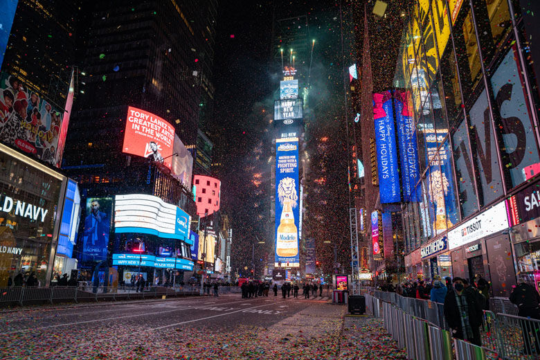 NEW YORK, NY - JANUARY 1: The New Year's Eve ball drops in a mostly empty Times Square on January 1, 2021, in New York City. On average, about one million revelers are drawn to the Crossroads of the World to watch performances and celebrate the New Year. This year a limited live audience of about 40 first responders and essential workers were allowed to watch the New Years' ball drop from a secure area in Times Square. (Photo by David Dee Delgado/Getty Images)