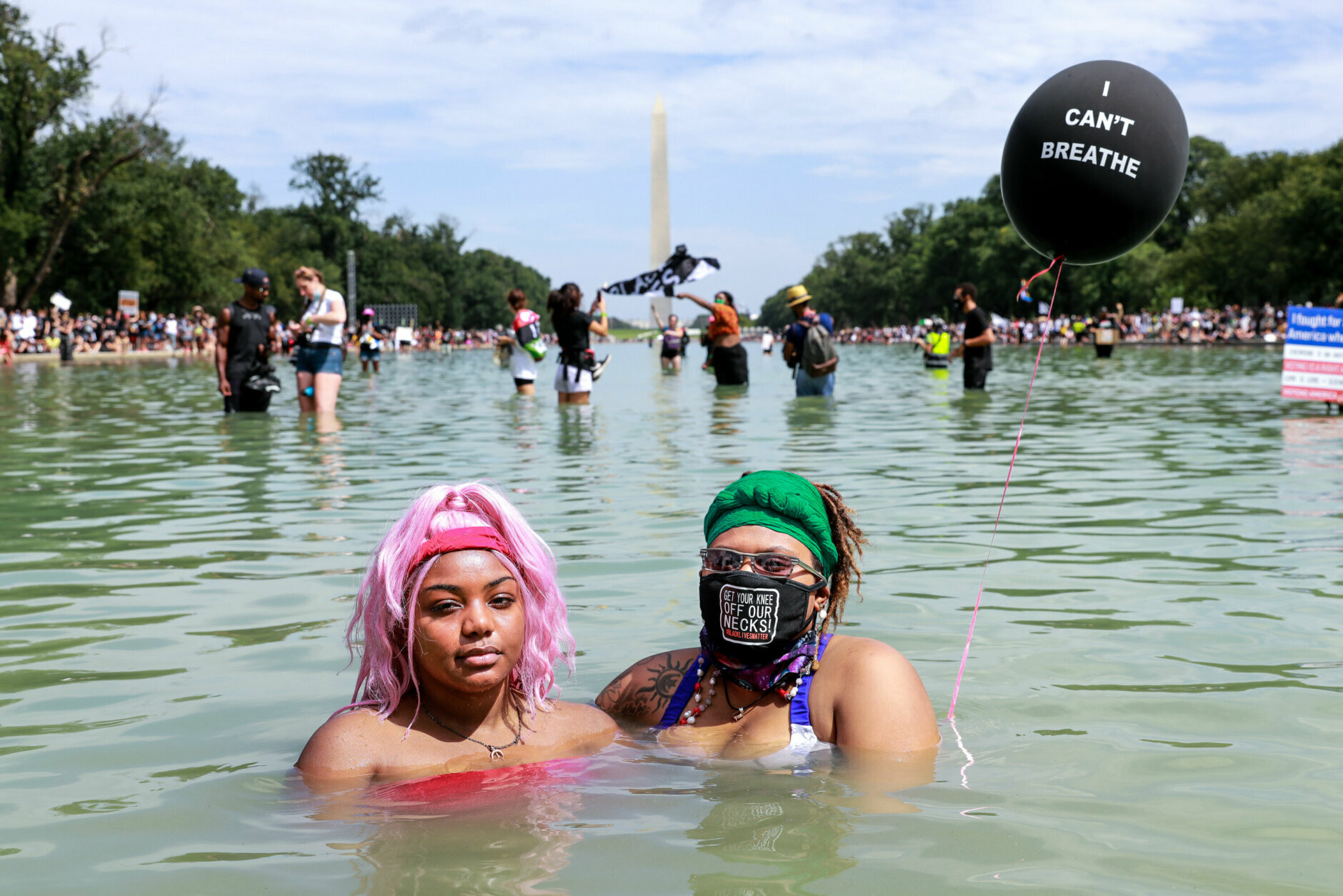 Demonstrators cooling off in the Lincoln Memorial Reflecting Pool.